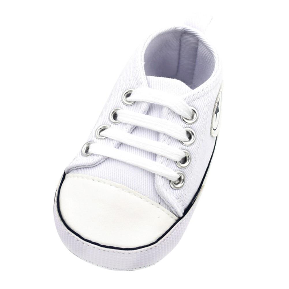 Stevvex white canvas baby first walkers sneaker with lace-up closure, rubber toe cap on Tampa Home & Garden Store