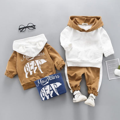 Two-piece baby boys hoodie and pants set in brown and white with bear graphic on Tampa Home & Garden Store