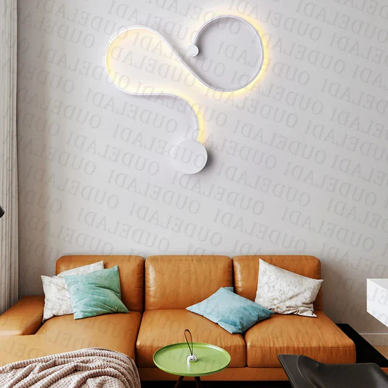 DecorBites LED aluminum wall lamp with circular, curved design and warm LED light on Tampa Home & Garden Store