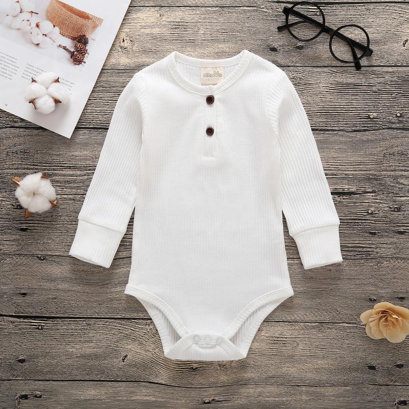Baby bodysuit romper Stevvex white ribbed with long sleeves and chest buttons, bottom snaps on Tampa Home & Garden Store