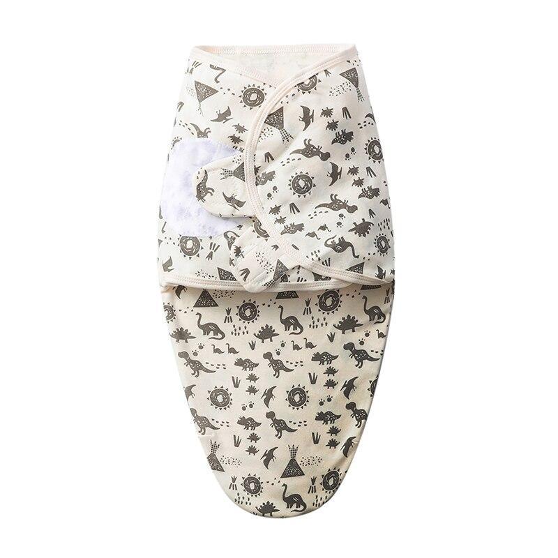Stevvex baby swaddle sleeping bag cream with black dinosaur print on Tampa Home & Garden Store