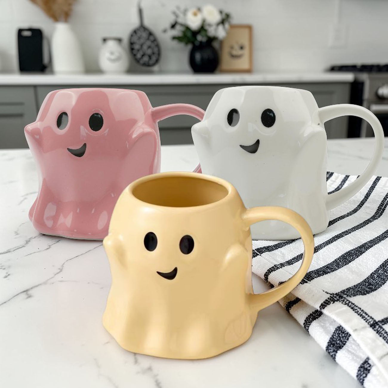 Ghost Mug trio in pink, white and yellow with friendly faces; Gia Roma coffee mugs on Tampa Home & Garden Store