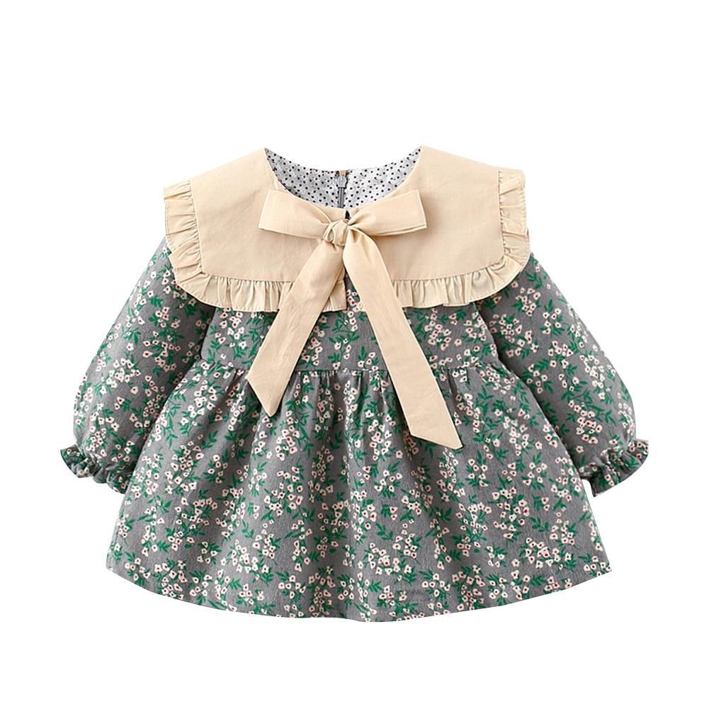 Stevvex Modern Retro Baby Girl Winter Dress with beige collar bow and green floral print on Tampa Home & Garden Store