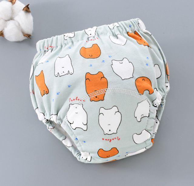 Baby training pants cloth diaper by Stevvex with 6-layer gauze cover in blue animal print on Tampa Home & Garden Store