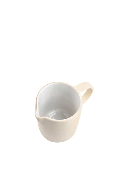 Handmade Stoneware Pitcher and Elegant Tableware