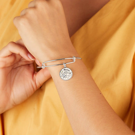 Happy Retirement charm bangle by Alex and Ani in silver with round beach scene charm on Tampa Home & Garden Store