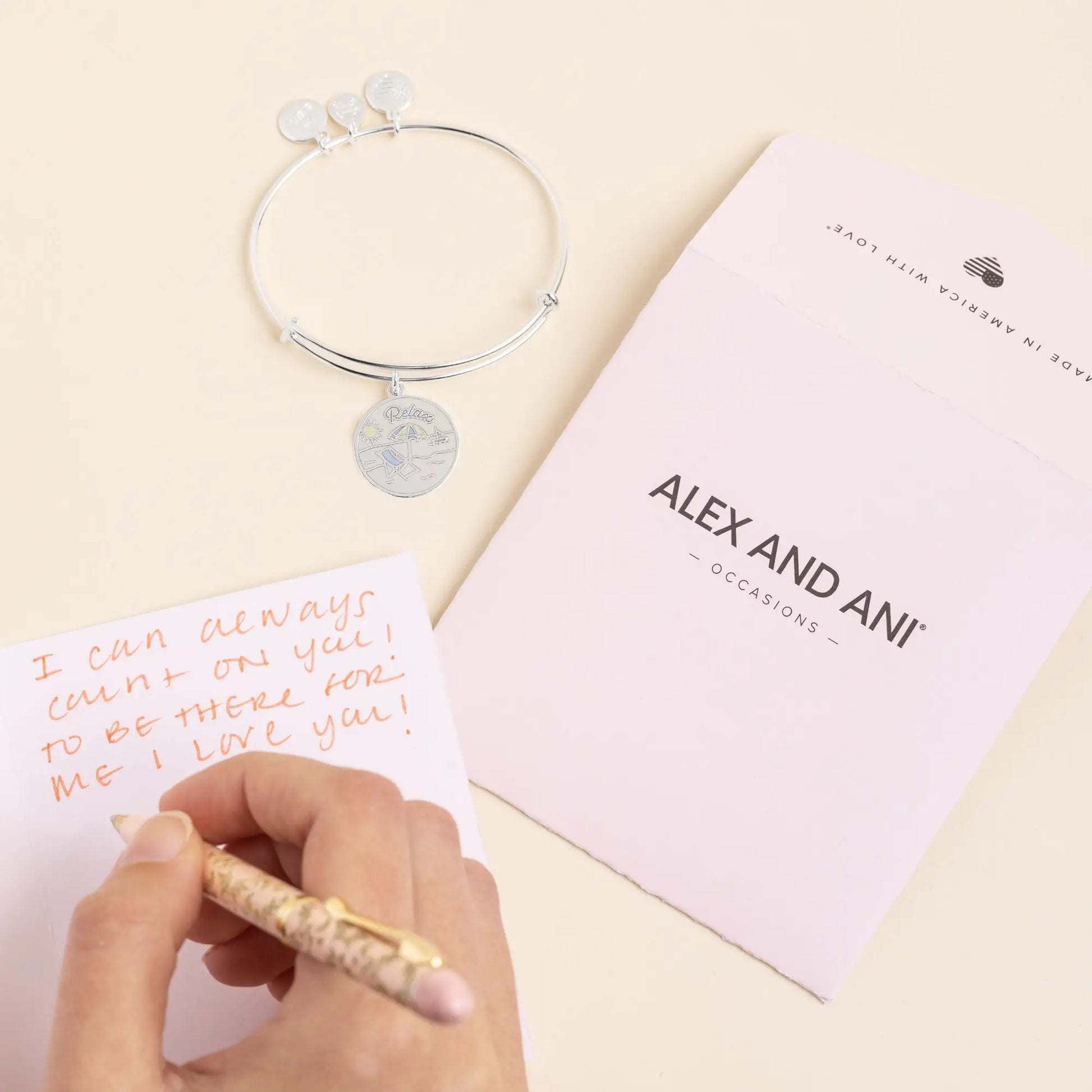 Bracelet Happy Retirement Bangle Alex and Ani, silver bangle with 3 disc charms and pendant on Tampa Home & Garden Store