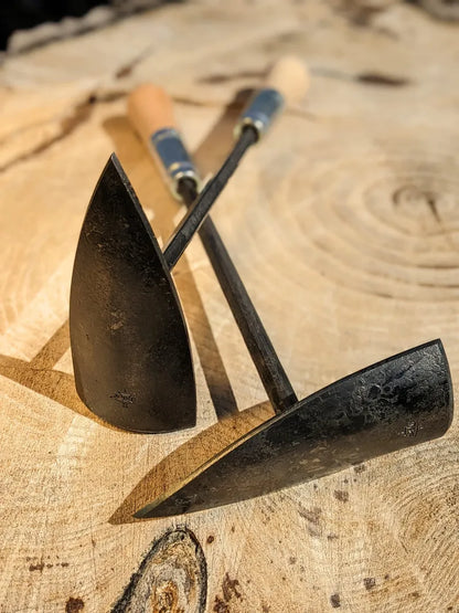 Hawk's Bill Weeder garden tools pair with black steel blades and blue-grip wooden handles on Tampa Home & Garden Store
