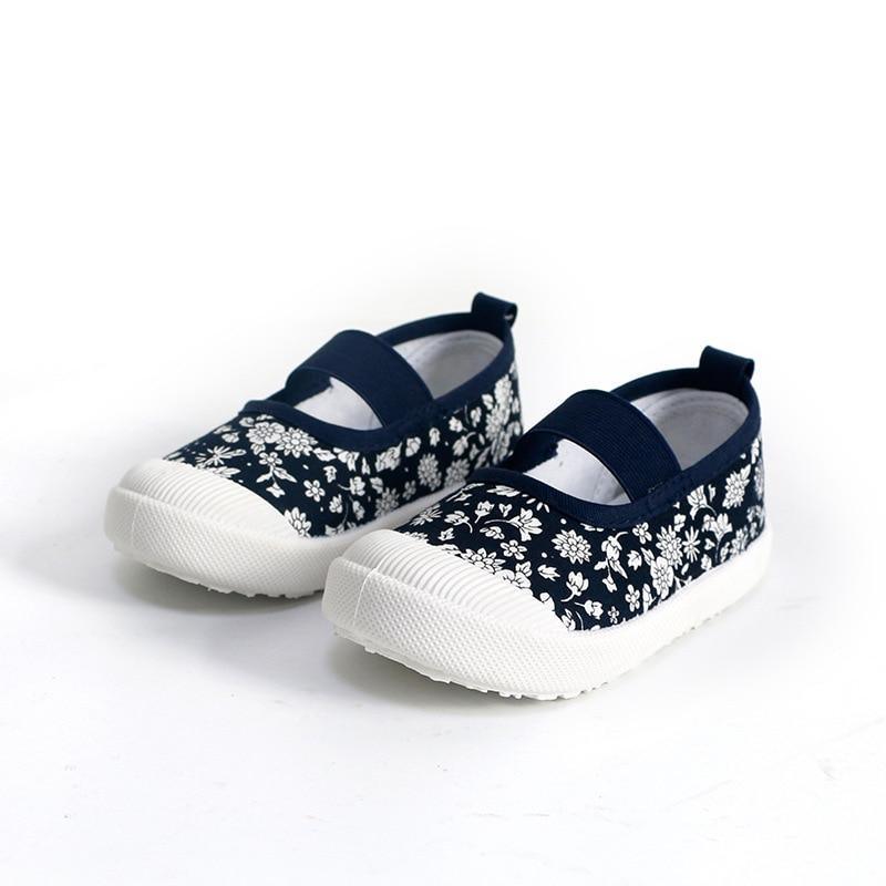 Stevvex baby girls canvas sneakers navy floral print with white toe cap and sole on Tampa Home & Garden Store