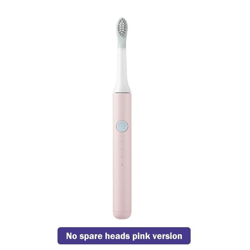 Pink electric sonic toothbrush with white brush head and single power button, travel-friendly on Tampa Home & Garden Store