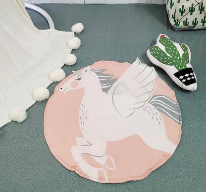 Round cotton baby play mat pink with a white unicorn design and wings for newborns and crawling on Tampa Home & Garden Store