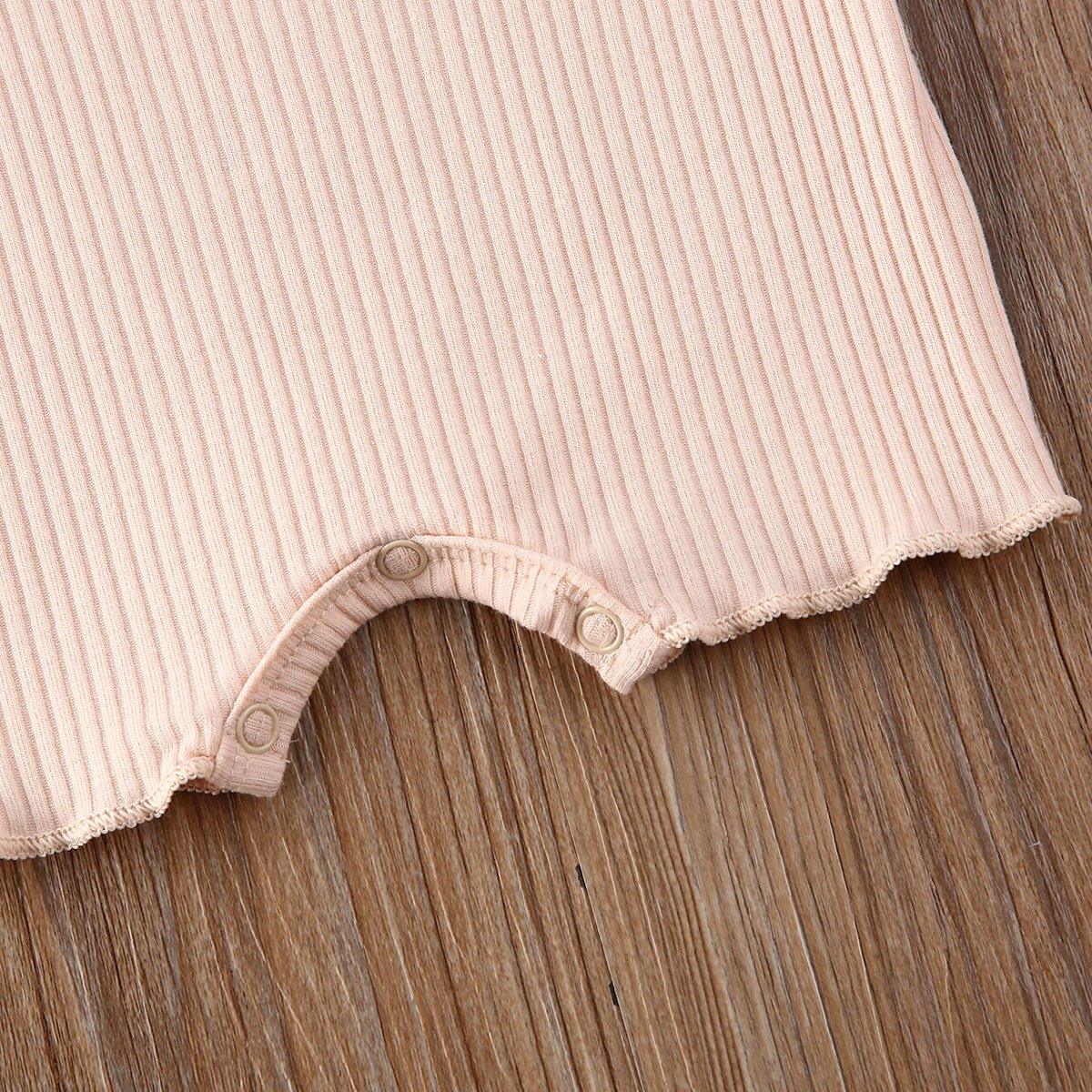 Ribbed cotton baby romper in pink with snap buttons at hem on Tampa Home & Garden Store