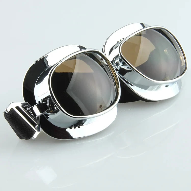 Motorcycle goggles chrome frame with dark tinted lenses, adjustable strap, two included on Tampa Home & Garden Store