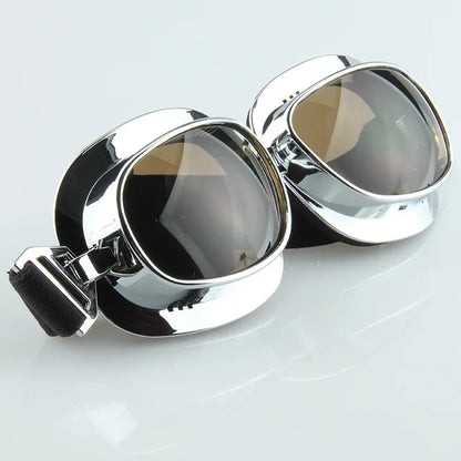 Motorcycle goggles chrome frame with dark tinted lenses, adjustable strap, two included on Tampa Home & Garden Store