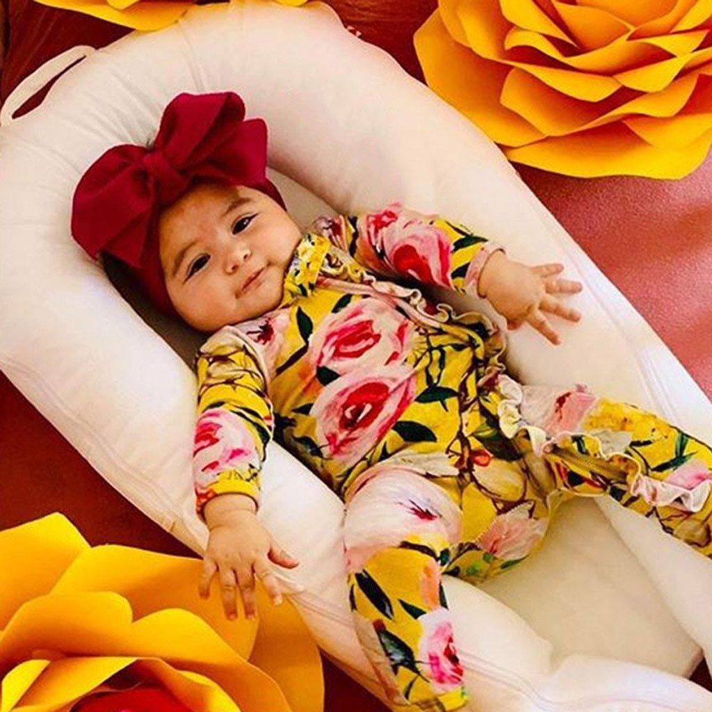 Stevvex floral newborn romper, full-sleeve footed yellow with pink roses, red bow headband on Tampa Home & Garden Store
