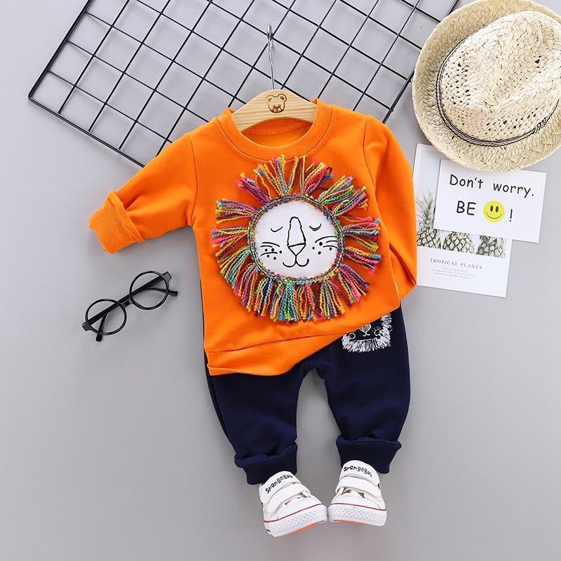 Stevvex baby boys 2pc orange lion-face applique sweatshirt with fringe and navy pants on Tampa Home & Garden Store
