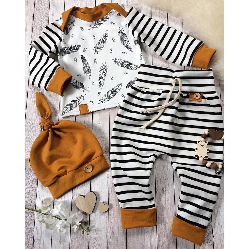 Stevvex 3-piece baby boy outfit set: white feather tee, black striped pants, mustard hat on Tampa Home & Garden Store