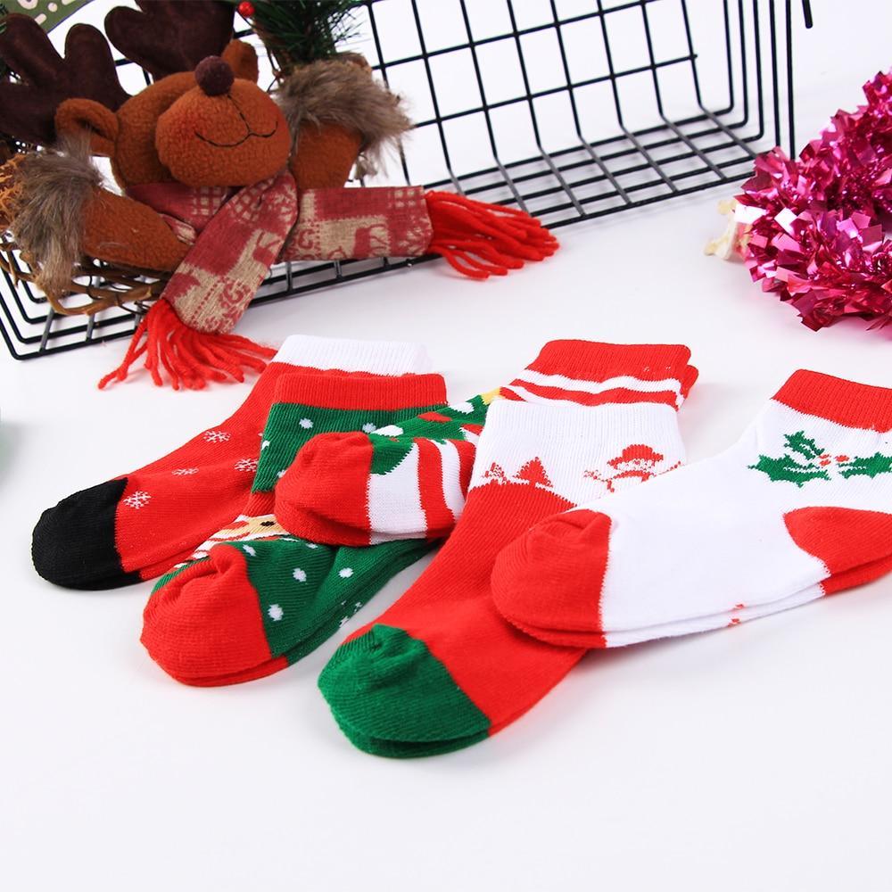 Baby Christmas socks 5-pair set in red, white, green with holiday patterns on Tampa Home & Garden Store