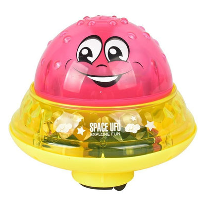 Stevvex space UFO bath toy with pink smiling dome and yellow transparent base on Tampa Home & Garden Store