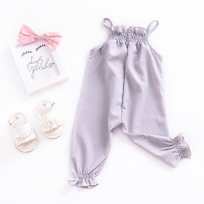 Stevvex lavender baby romper with thin shoulder straps, smocked top and elastic ankle cuffs on Tampa Home & Garden Store
