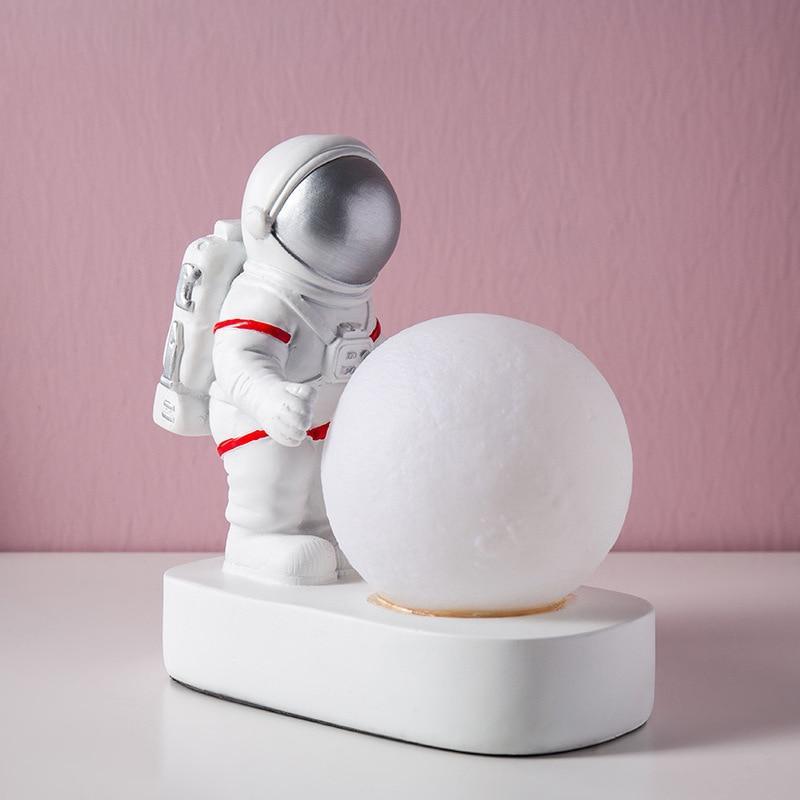Stevvex 2-piece astronaut night light with moon ball on white base on Tampa Home & Garden Store