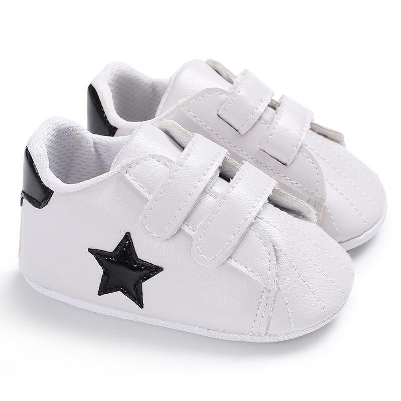 White PU leather baby sneakers with black star patch and Velcro straps Stevvex first walkers on Tampa Home & Garden Store