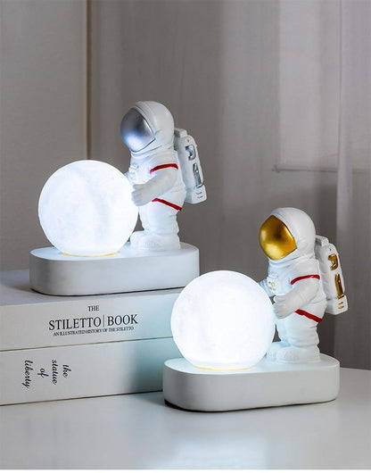 STEVVEX astronaut spaceman moon night light duo with glowing moon orbs on white bases on Tampa Home & Garden Store