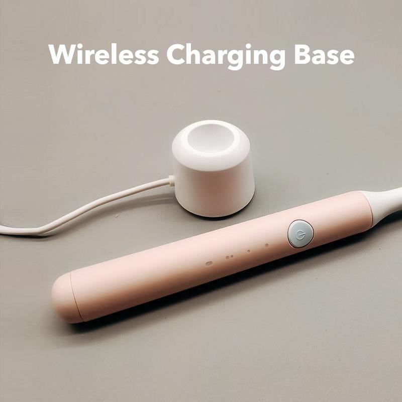 Stevvex pink sonic toothbrush with wireless charging base and cord on Tampa Home & Garden Store
