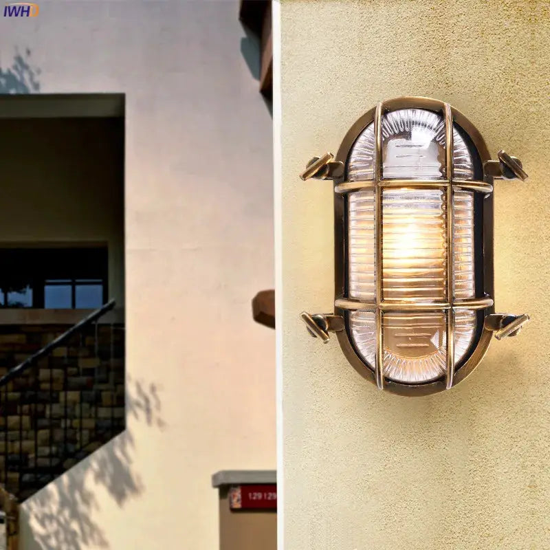 DecorBites Industrial Outdoor Wall Lamp bronze metal cage; waterproof LED porch light on Tampa Home & Garden Store