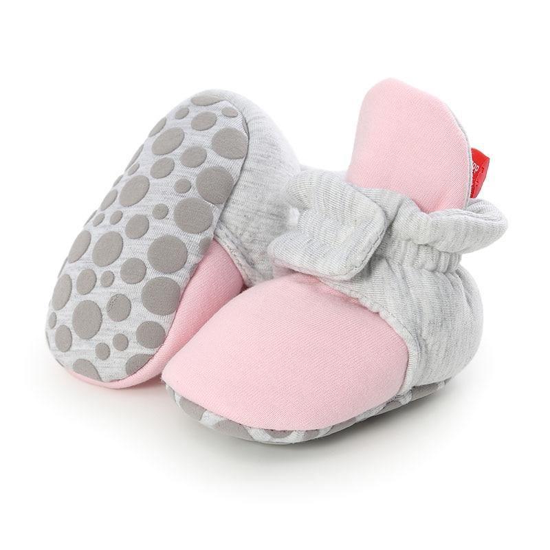 Stevvex baby booties pair in pink and gray faux fleece with soft sole and dotted grip on Tampa Home & Garden Store