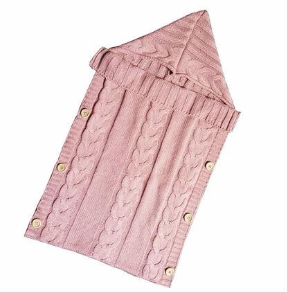 Stevvex pink knitted baby swaddle blanket with cable-knit pattern and buttoned envelope on Tampa Home & Garden Store