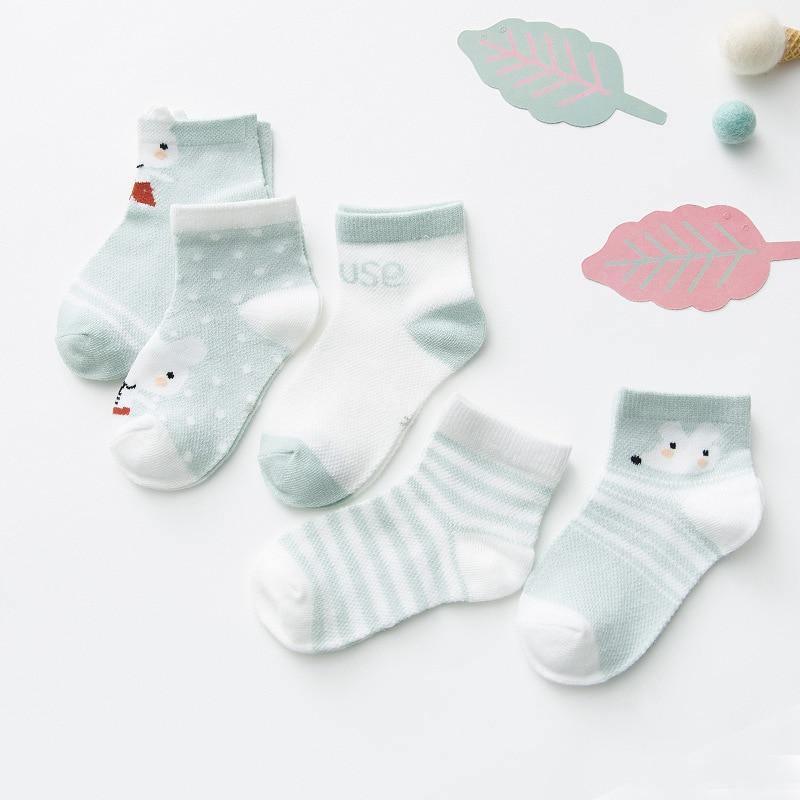 Cotton baby girls socks 5-pair set in mint and white with cute cartoon faces on Tampa Home & Garden Store