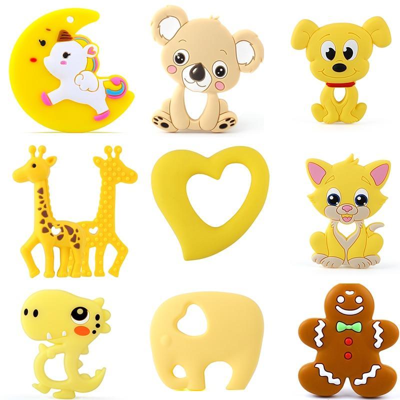 Baby animal silicone teethers set in yellow featuring moon unicorn koala dog giraffes heart on Tampa Home & Garden Store