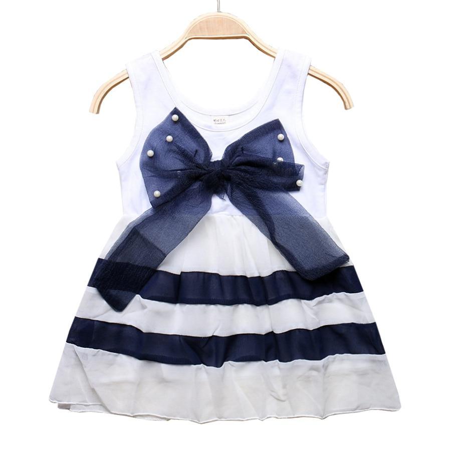 Stevvex baby dress sleeveless white top with navy striped tiered skirt and large bow pearls on Tampa Home & Garden Store