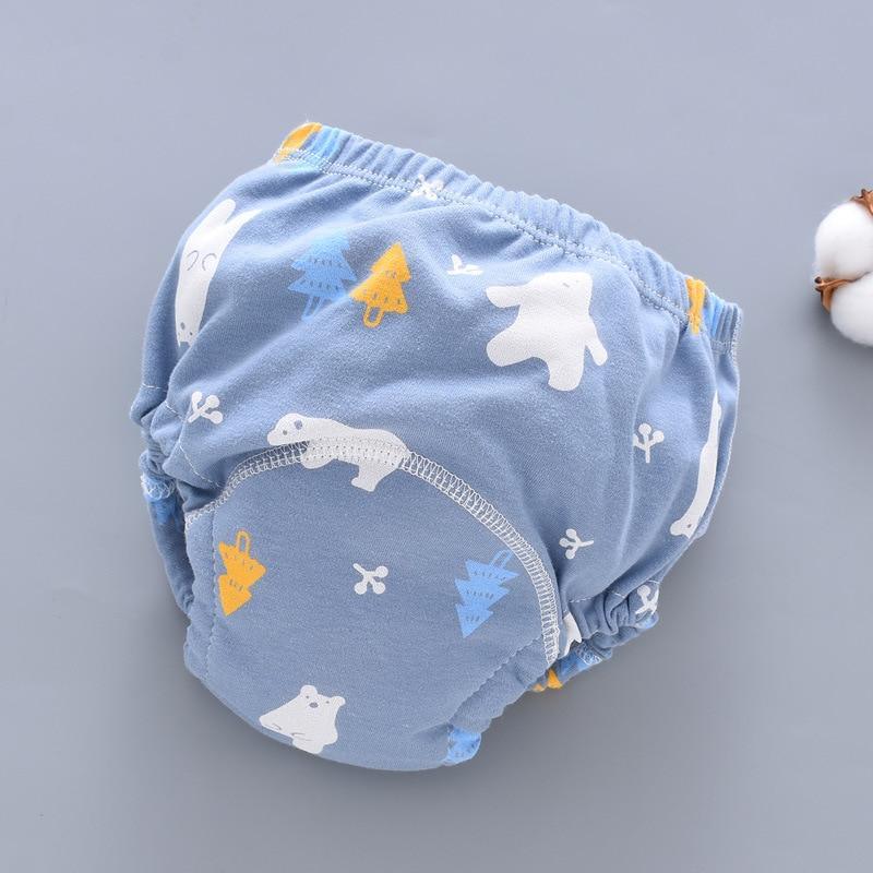 Stevvex blue baby training pants cloth diaper with white animal prints and trees on Tampa Home & Garden Store