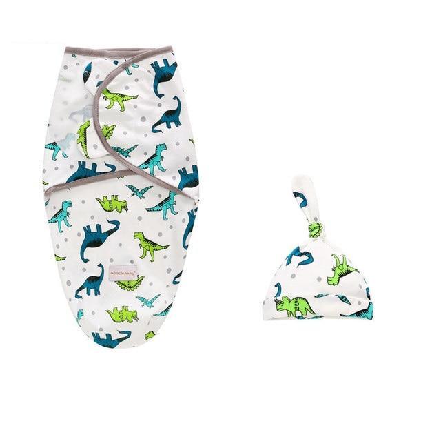 Two-piece newborn swaddle wrap and hat set by Stevvex; white with blue and green dinosaurs on Tampa Home & Garden Store