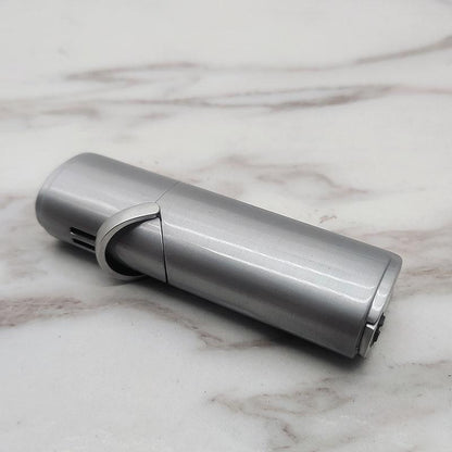 Stevvex silver metal lighter in compact cylindrical design on Tampa Home & Garden Store