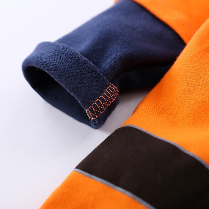 Baby romper sleeve: navy cuff with orange stitching beside orange fabric and black stripe on Tampa Home & Garden Store