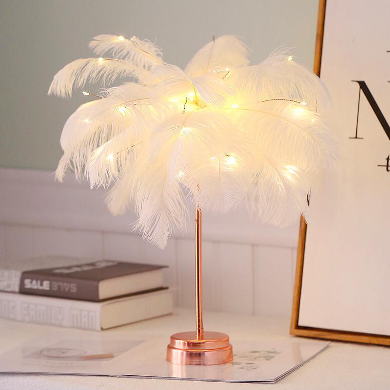 Stevvex feather table lamp with white feather shade and warm LED lights, rose-gold base on Tampa Home & Garden Store