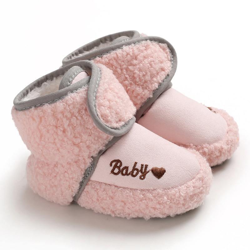 Stevvex pink newborn baby booties with fluffy plush lining and gray trim on Tampa Home & Garden Store