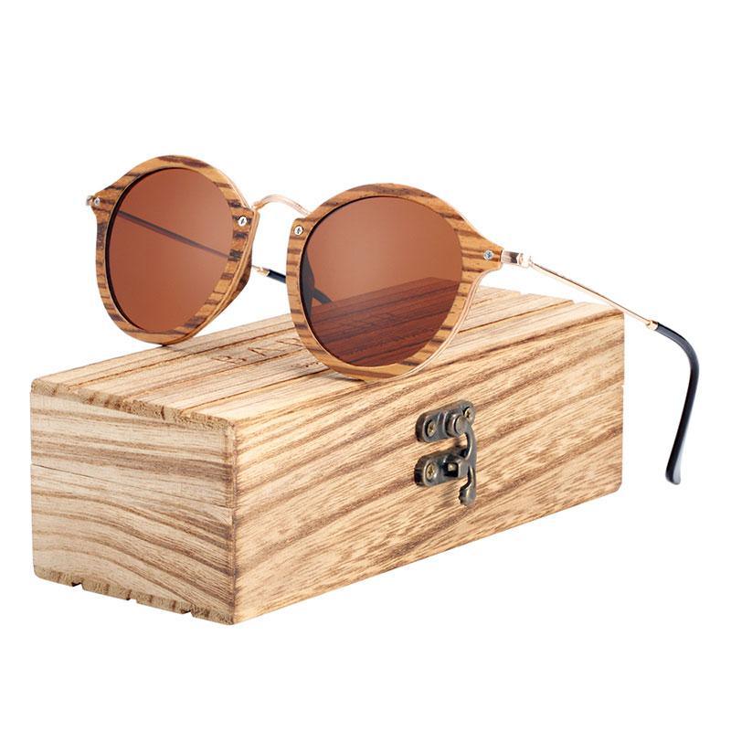 Stevvex zebra wood round sunglasses with polarized UV400 lenses on a wooden display box on Tampa Home & Garden Store