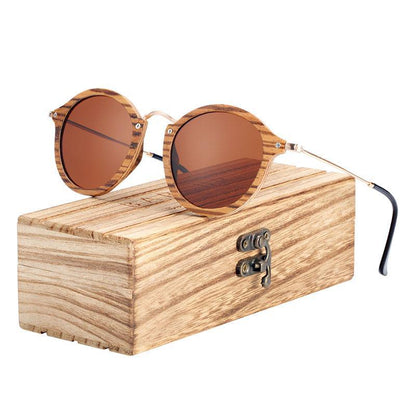 Stevvex zebra wood round sunglasses with polarized UV400 lenses on a wooden display box on Tampa Home & Garden Store