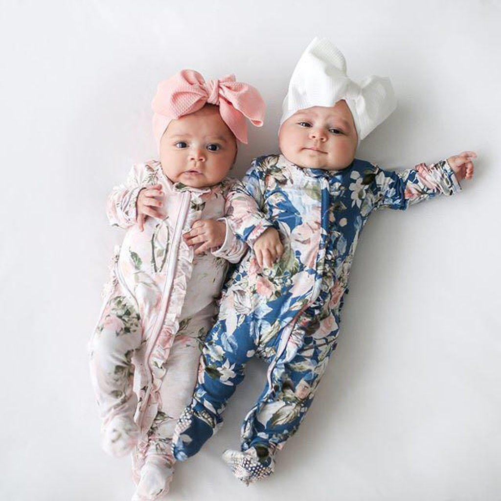 Floral baby girl romper set, two footed, long sleeves, blue and pink prints with big bows on Tampa Home & Garden Store