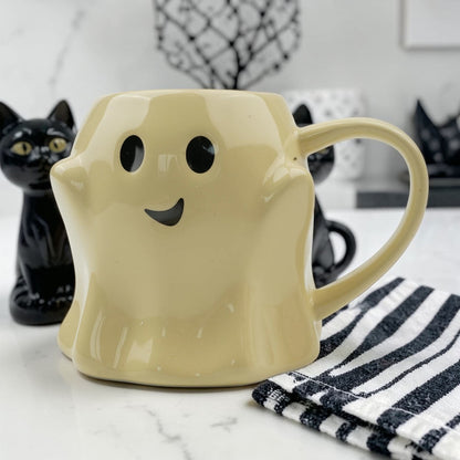 Ghost mug cream-colored ceramic coffee mug with cute black eyes and smile on Tampa Home & Garden Store