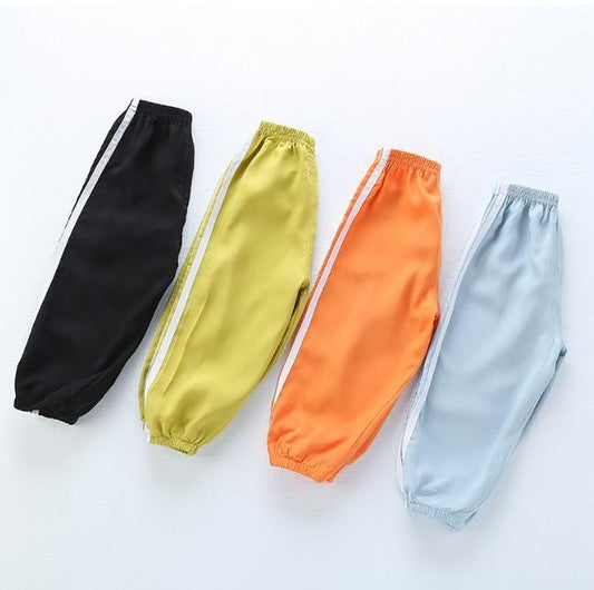 Modern NEW TREND kids sports pants set in black yellow orange blue with white side stripes on Tampa Home & Garden Store