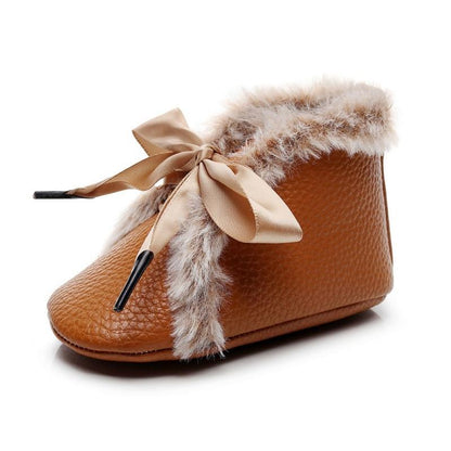 Baby PU bootie in brown textured leather with faux fur trim and satin bow lace-up on Tampa Home & Garden Store