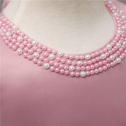 Stevvex pink baby dress with pink and white pearl bead collar for christening or birthday party on Tampa Home & Garden Store