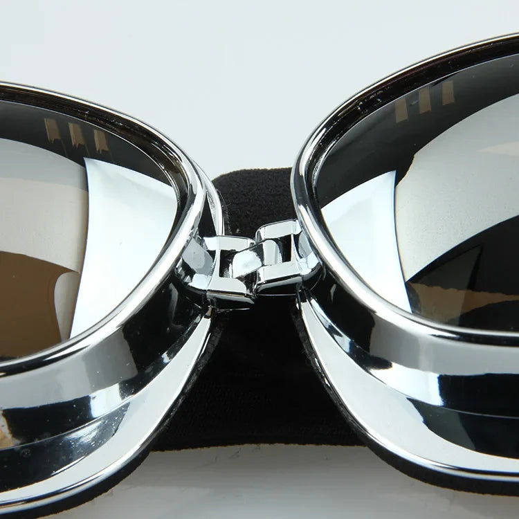 Motorcycle goggles pair by BikerZoneZ with chrome frames and mirrored lenses on Tampa Home & Garden Store