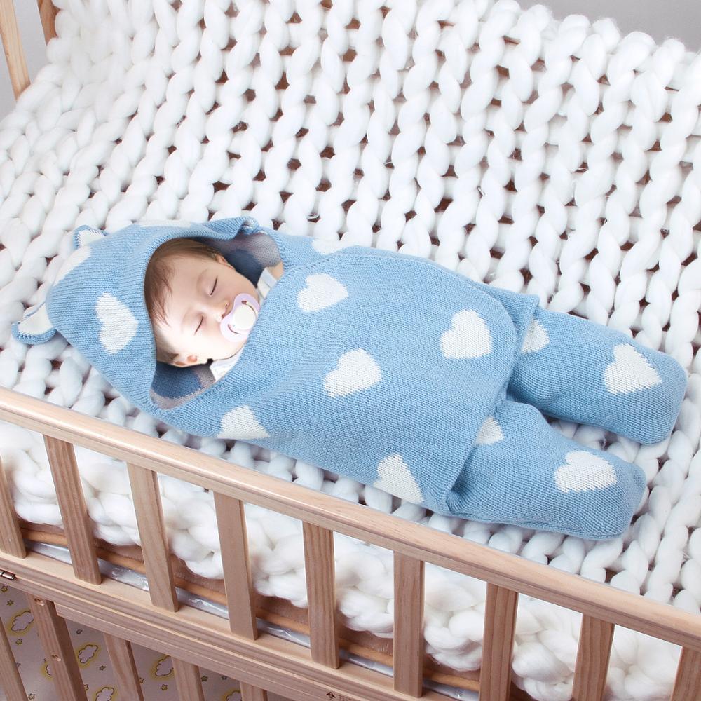 Stevvex blue knitted baby sleeping bag envelope with white heart pattern for newborns on Tampa Home & Garden Store