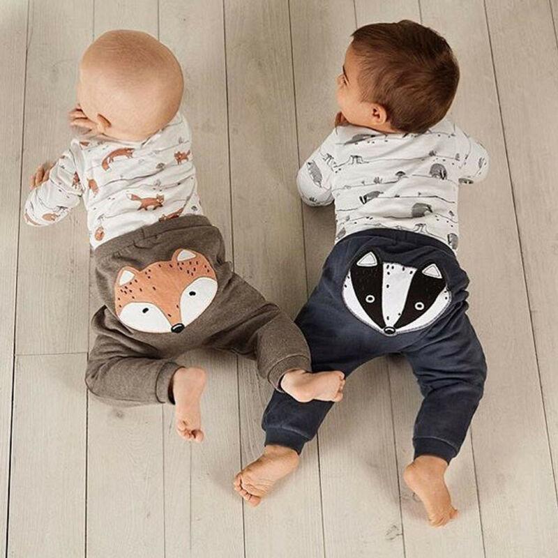 Stevvex newborn baby outfits two-piece set with fox print gray pants and raccoon print navy pants on Tampa Home & Garden Store
